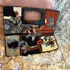 Amazing beaded clutch by Anthropologie.